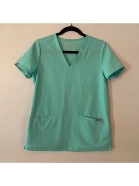 FIGS Fresh Aqua Blue Casma Scrub Top Two Pocket Uniform Nurse Dr Women's size XS